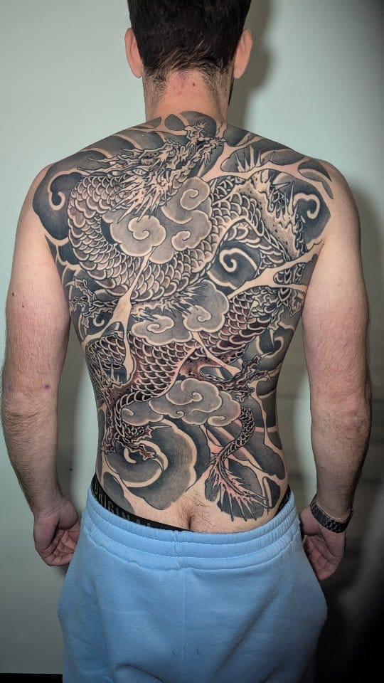 Argustattoo jarrat dragon backpiece, tattoo by Jarrat Tattoo at Argus Tattoo in Antwerp