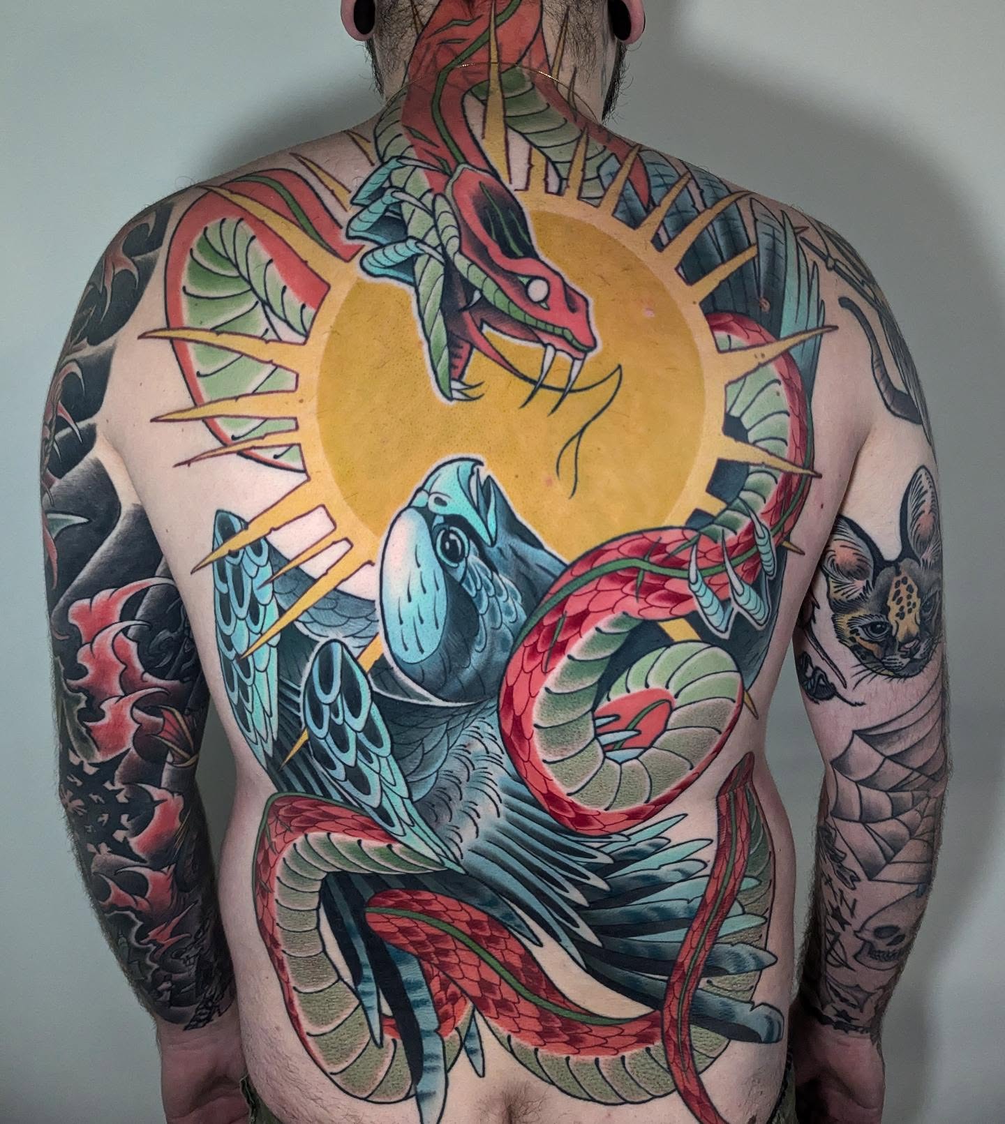 Argustattoo stickystef backpiece snake and eagle, tattoo by Sticky Stef at Argus Tattoo in Antwerp